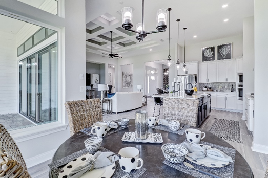 Low Maintenance Living is easily achieved when you have a Large Open Floor Plan with Large Kitchen & Island that looks into the gathering room and eat in kitchen nook. Great for entertaining. 